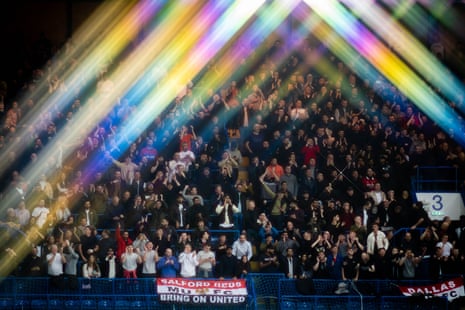 Manchester United fans show their support during the Premier League match against Chelsea.