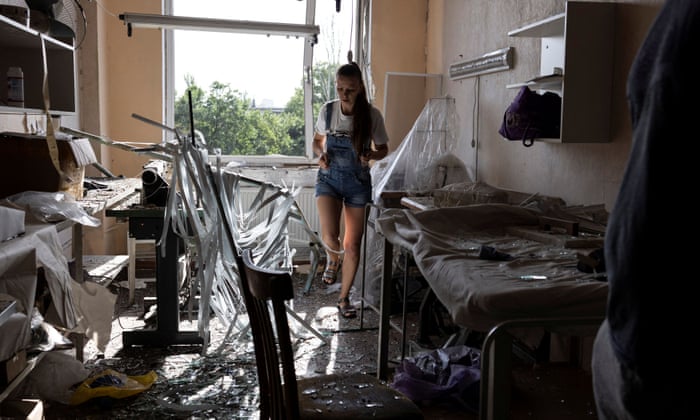 A local business owner inspects her sewing workshop damaged by a Russian missile strike in Mykolaiv, Ukraine. REUTERS/Umit Bektas