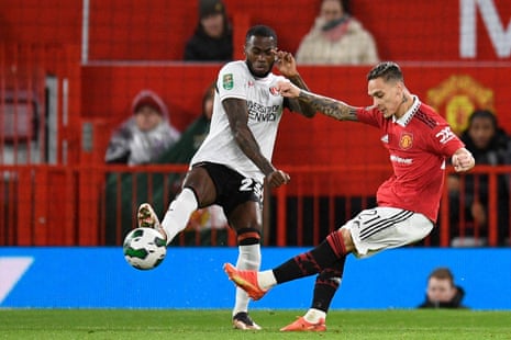 Manchester United's Antony (right) shoots to open the scoring with a fine finish.