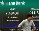 Global stock markets fall as concerns persist over tech firms at heart of AI boom