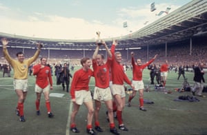 Bobby Charlton raises the Jules Rimet trophy after the 1966 final.
