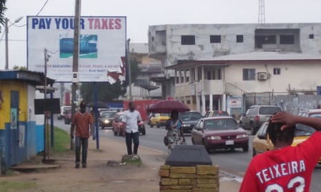A pay your tax billboard in Liberia