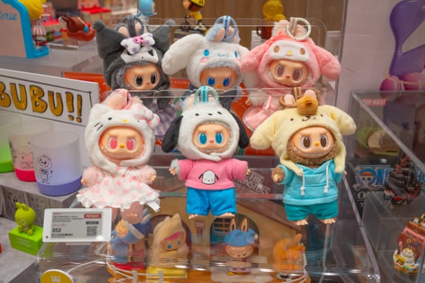 Mini Labubu toys are displayed in a shopping mall