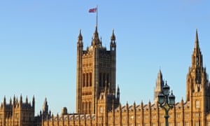 A union flag flies on top of the Victoria Tower, part of the Palace of Westminster in London.