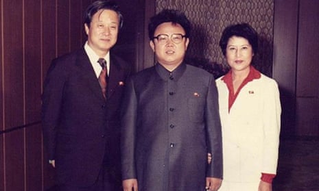 Kim Jong-il, centre, with the couple he kidnapped to help improve North Korean films