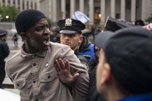A man is arrested by NYPD officers