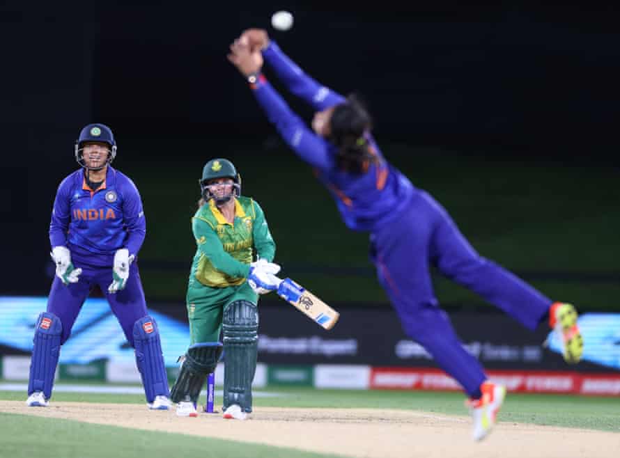 Sneh Rana from India dives and misses a catch off Mignon du Preez.