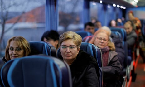 Kosovo ethnic Serbs sit on a bus in the town of Gracanica, Kosovo