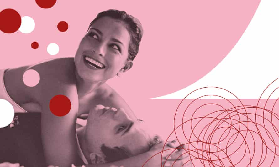 Woman on top of a man in bed