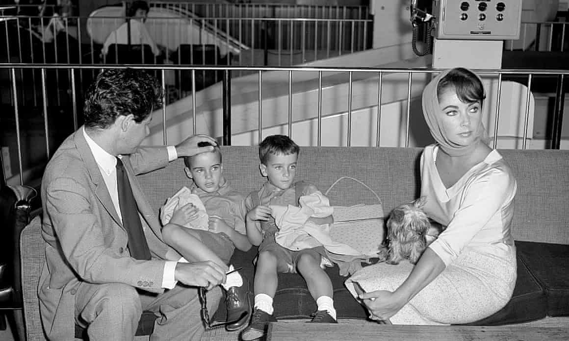 Elizabeth Taylor and her fourth husband, Eddie Fisher, and her two sons from her former marriage, Michael Wilding Jr, six, and Christopher Wilding, four