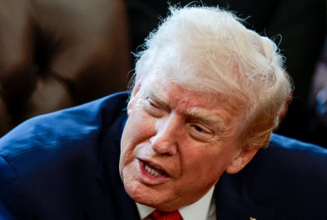 US President Donald Trump speaks in the Oval Office as he signs an executive order, at the White House in Washington, D.C., US.