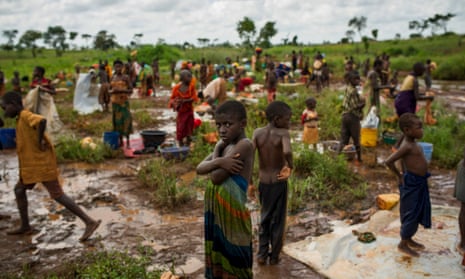 Burundi refugees wash their clothes near a river on the edge of the Nyarugusu refugee camp in Tanzania.