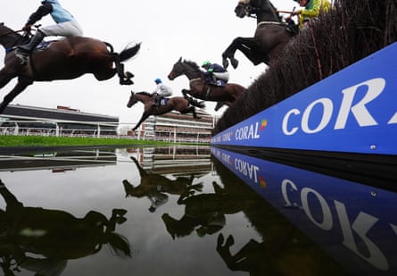 Old Cowboy (centre, No 5) on his way to winning the Coral Racing Club ‘Join For Free’ Handicap Chase at Newbury
