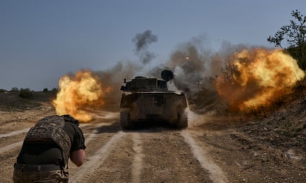 Ukrainian soldiers fire a self-propelled howitzer in the Kherson region of Ukraine.