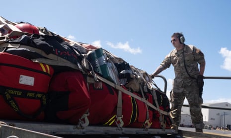 In this image obtained from the US Department of Defense, Staff Sgt. Trevor Connors loads supplies onto a C-17 Globemaster III on August 10, 2023, at Joint Base Pearl Harbor-Hickam in Honolulu, Hawaii. Supplies, vehicles and personnel from the Honolulu Fire Department were transported to the Island of Maui to help fight wildfires that have impacted the island.