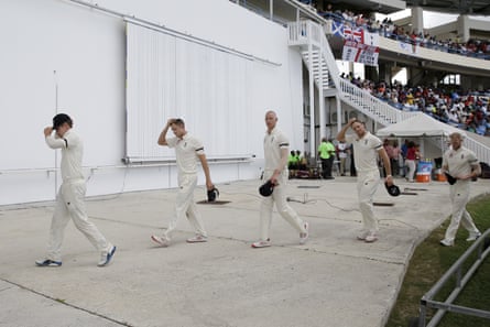 England players walk to the pavilion after losing the second Test and the series to West Indies.