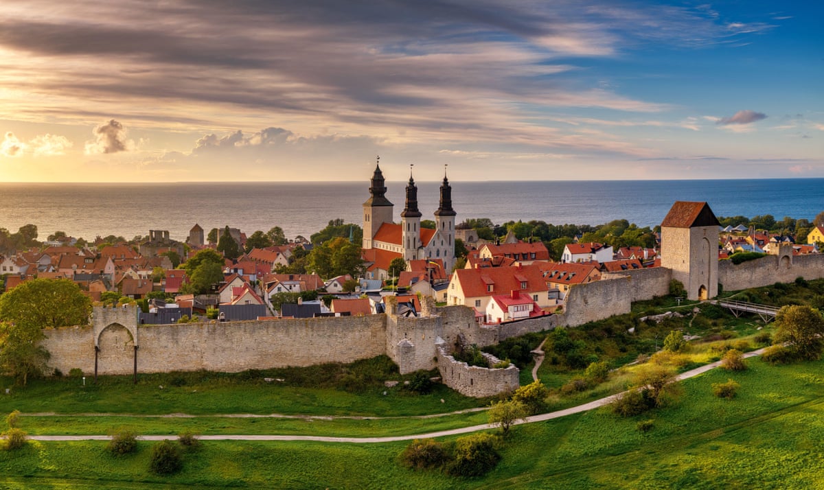 Walled old town on an island in evening light.