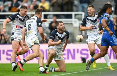 Elliott Whitehead of England celebrates scoring his second try.