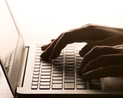 Woman typing on laptop