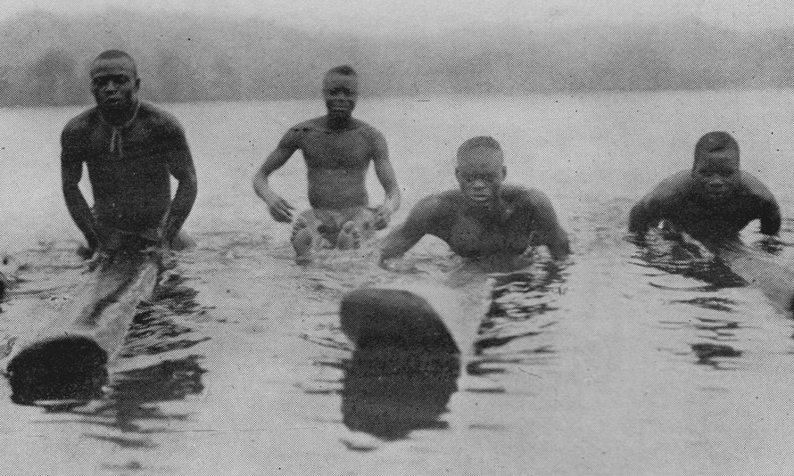 Surfers with padua planks in present-day Ghana in 1923.