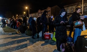 People queue for the train to Kiyv at the railway station in Przemysl, late 7 April.