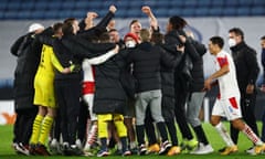 Slavia Prague players celebrate after the match.