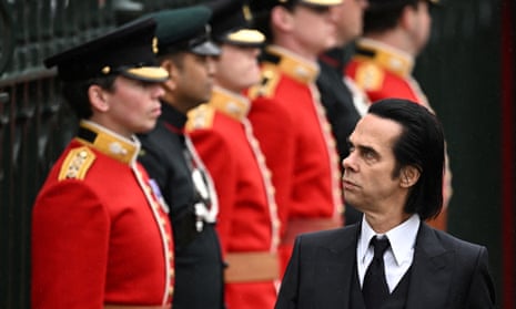 Nick Cave leaves Westminster Abbey following Britain’s King Charles’ coronation ceremony.