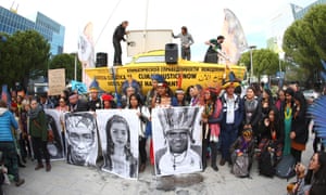 Extinction Rebellion activists stage a rally outside the COP25 summit in Madrid