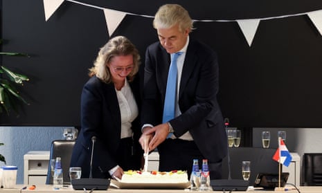 Dutch far-right politician and leader of the PVV party, Geert Wilders cuts a cake as he meets members of his party at the Dutch parliament in The Hague.