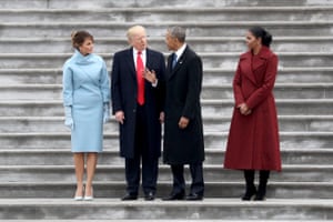 Trump and his wife Melania with Barack and Michelle Obama at the inauguration in January 2017.