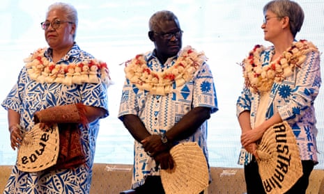 Penny Wong and Solomon Islands PM Manasseh Sogavare chat as Samoa PM Fiamē Naomi Mataʻafa looks on