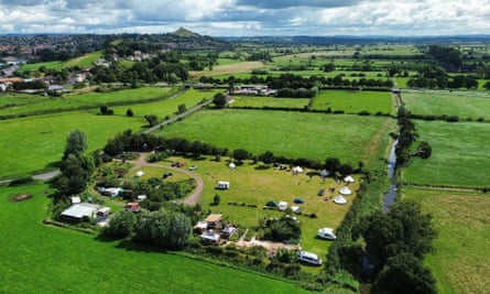 campsite, with Glastonbury Tor in distance