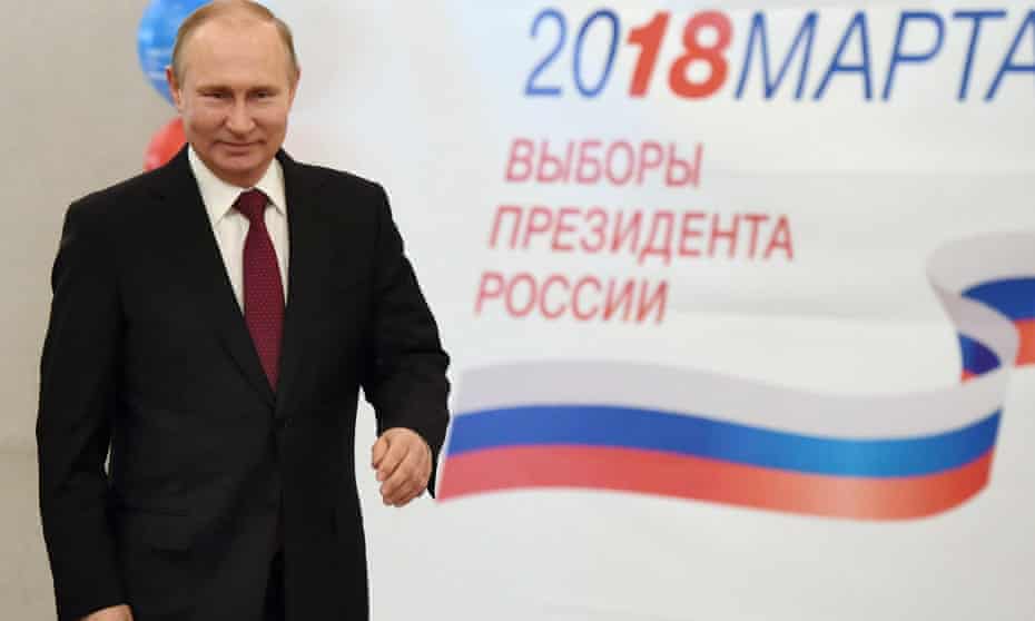 Vladimir Putin at a Moscow polling station on Sunday.