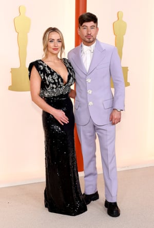 Barry Keoghan and his partner Alyson Kierans both wore Louis Vuitton. Keoghan is fond of a colourful suit and this lavender hued one with embellished floral buttons is a great one to add to his collection.