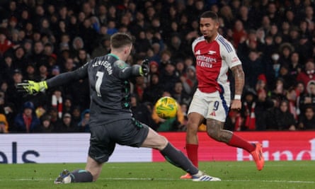 Gabriel Jesus lifts the ball over Dean Henderson to score Arsenal’s equaliser.