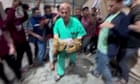 Gaza medics pull baby from womb of mother killed in Israeli airstrike – video