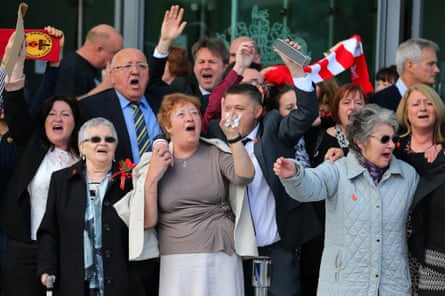 Relatives of people killed at Hillsborough, including Brenda Fox (centre, pointing), sing You’ll Never Walk Alone after the Hillsborough inquest verdict in April 2016.