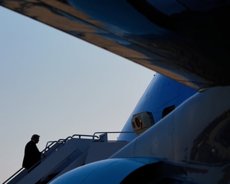 President Donald Trump boards Air Force One.