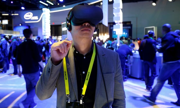 Summer Tan of China tries out the Oculus Rift virtual reality headset during CES in Las Vegas, Nevada on 5 January 2017.