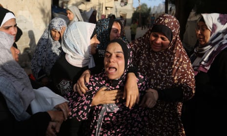Palestinians mourn lost relatives at a hospital in the southern Gaza Strip city of Rafah.