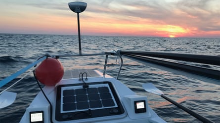 The sun rises on another day of rowing for Bryce Carlson, who set a record for solo rowing across the Atlantic Ocean