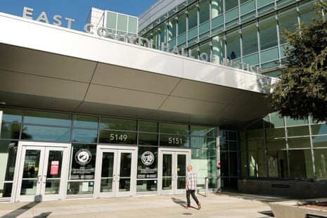 A man walks past the entrance of the East County Hall of Justice courthouse
