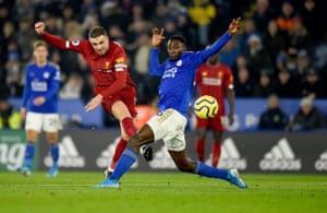 Henderson fires a shot past Leicester’s Wilfred Ndidi.