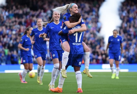 Ellie Carpenter celebrates with Sandy Baltimore after scoring for Chelsea against London City Lionesses.