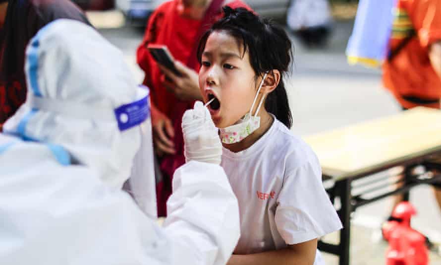 A person being tested for Covid in Wuhan