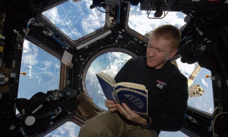 Tim Peake relaxes with cosmonaut Yuri Gagarin’s autobiography Road to the Stars