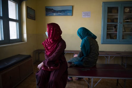 Two teenage girls sit in the waiting room of a leading Kashmiri psychiatrist in the summer capital Srinagar. Both are being treated for depression