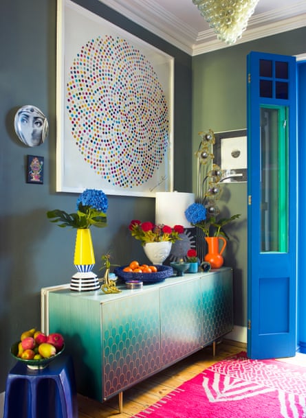 Damien Hirst artwork hanging above a sideboard by Bethan Gray.