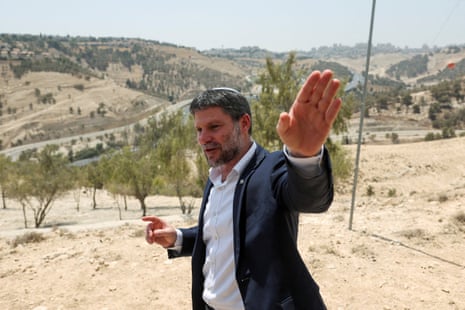 Israeli Finance Minister Smotrich speaks at a press conference regarding settlements expansion, near the Israeli settlement of Maale Adumim, in the Israeli-occupied West Bank, August 14, 2025.
