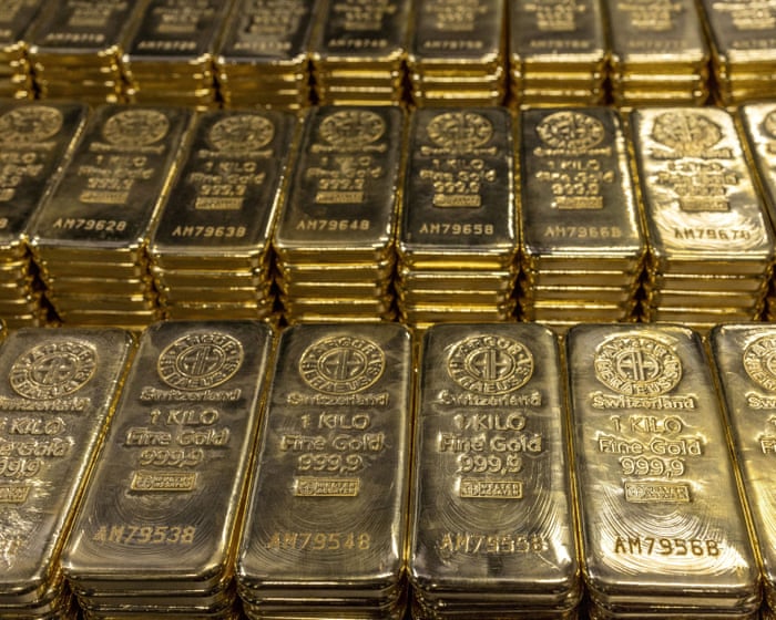 Gold futures rise to new high after reports Trump has imposed tariffs on one-kilo bars – business live